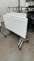 Used White Flip Top Rolling Table
