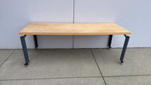 Load image into Gallery viewer, Used Custom Wood Door Rolling Table w/ Herman Miller Legs
