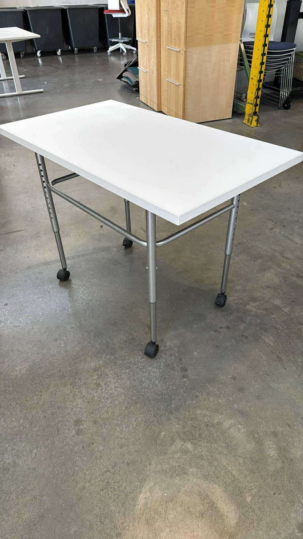 Herman Miller Height-Adjustable Rolling Table – 48" x 24"