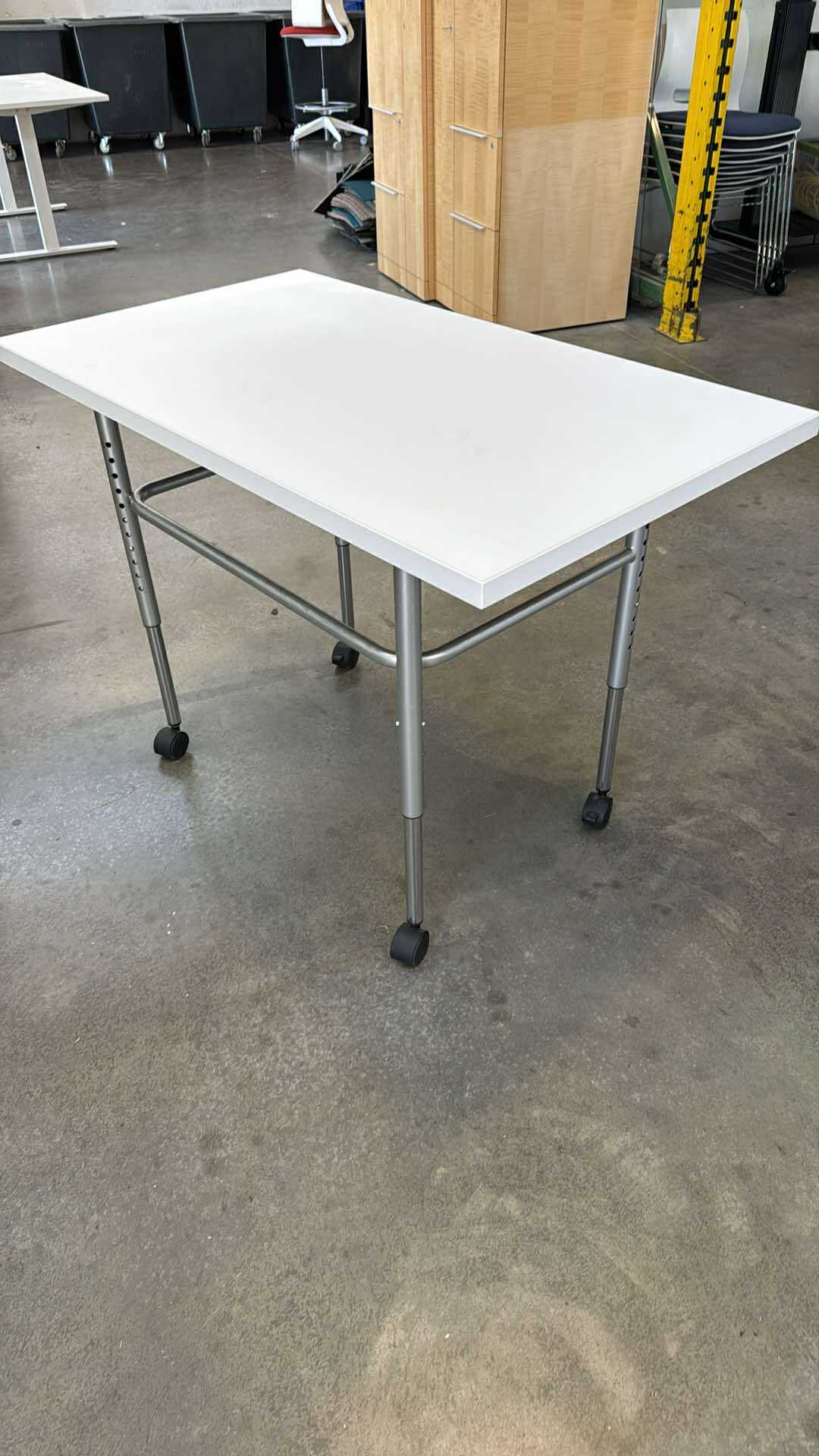 Herman Miller Height-Adjustable Rolling Table – 48" x 24"