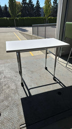 Herman Miller Height-Adjustable Rolling Table – 48" x 24"