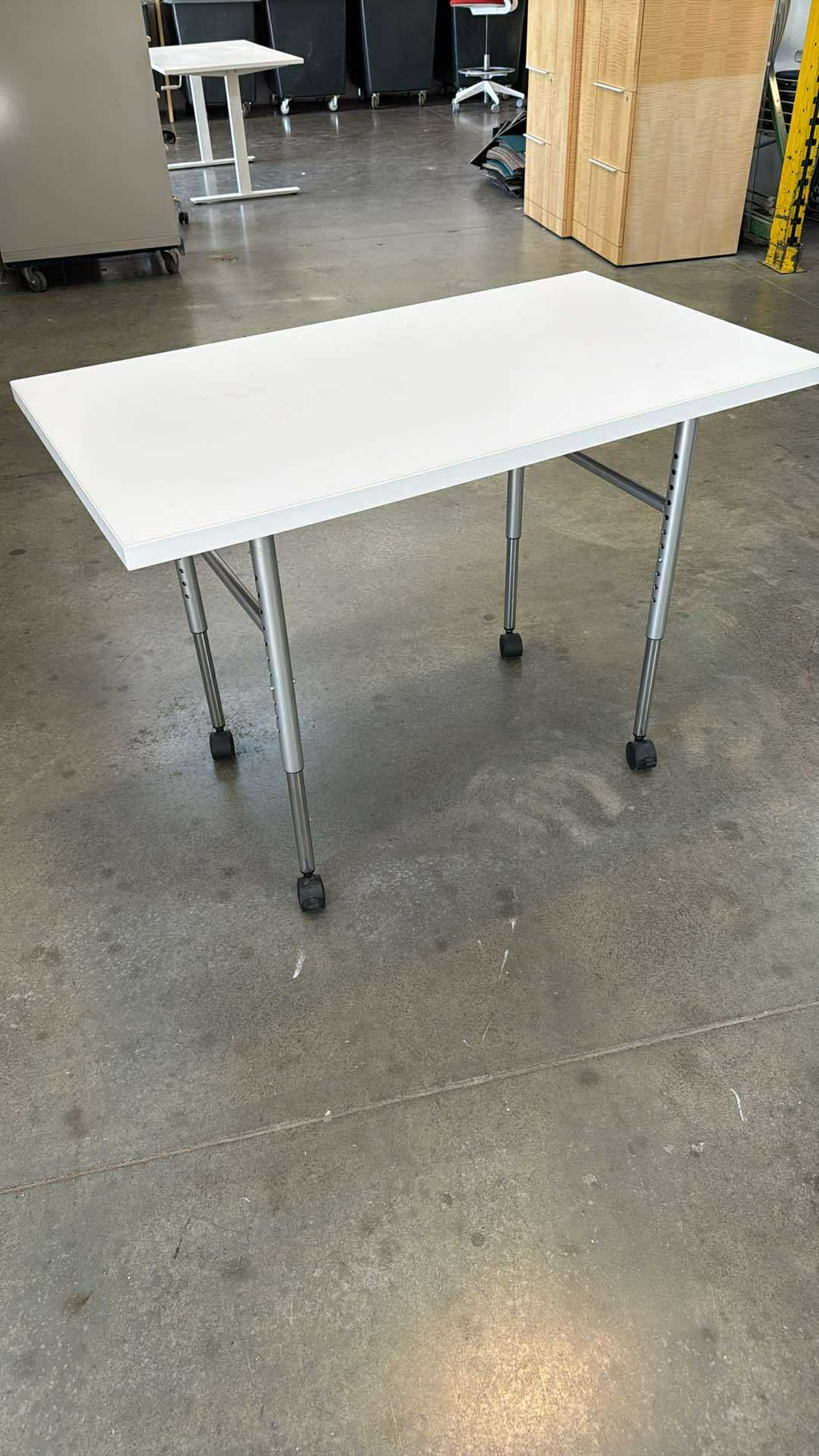 Herman Miller Height-Adjustable Rolling Table – 48" x 24"