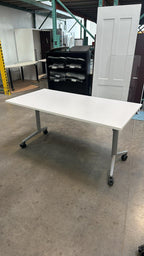 Used White Flip Top Rolling Table