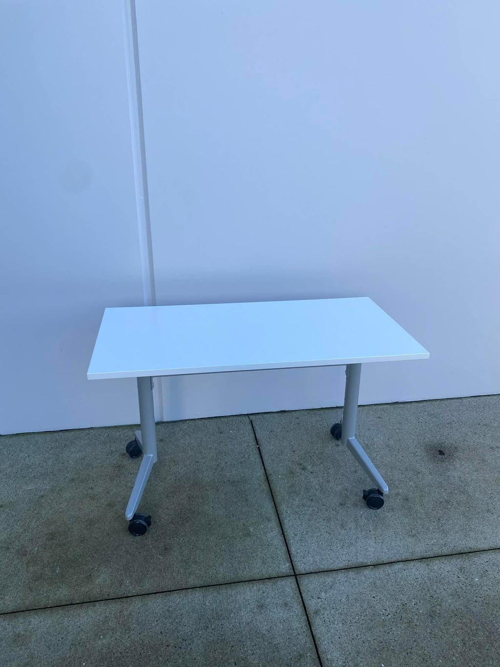 Used White Flip Top Rolling Table