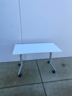 Used White Flip Top Rolling Table