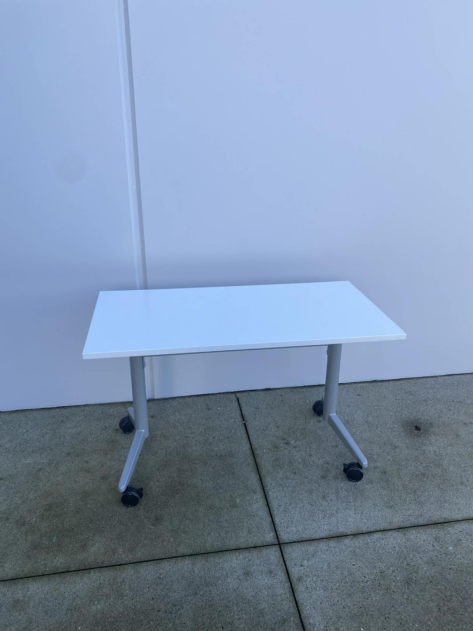 Used White Flip Top Rolling Table