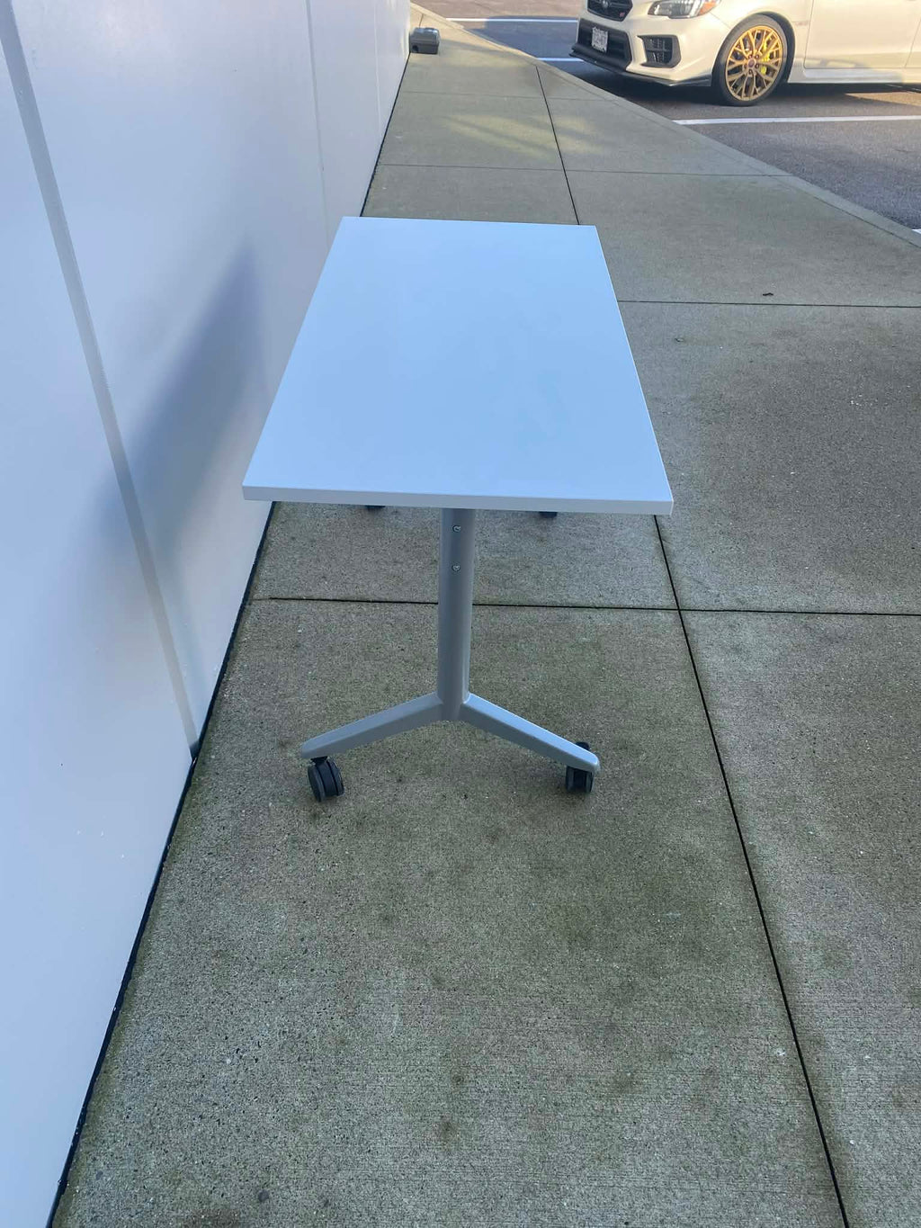 Used White Flip Top Rolling Table