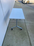 Used White Flip Top Rolling Table